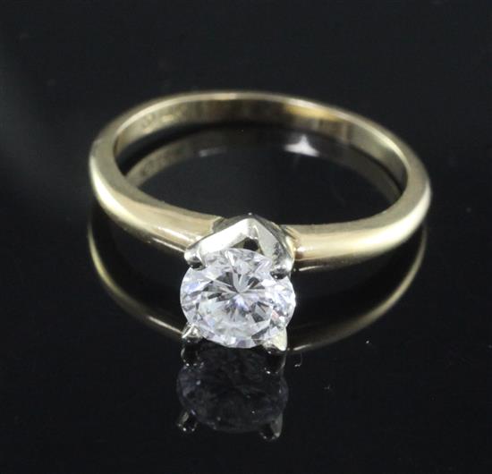 A 14ct gold and solitaire diamond ring, size M.